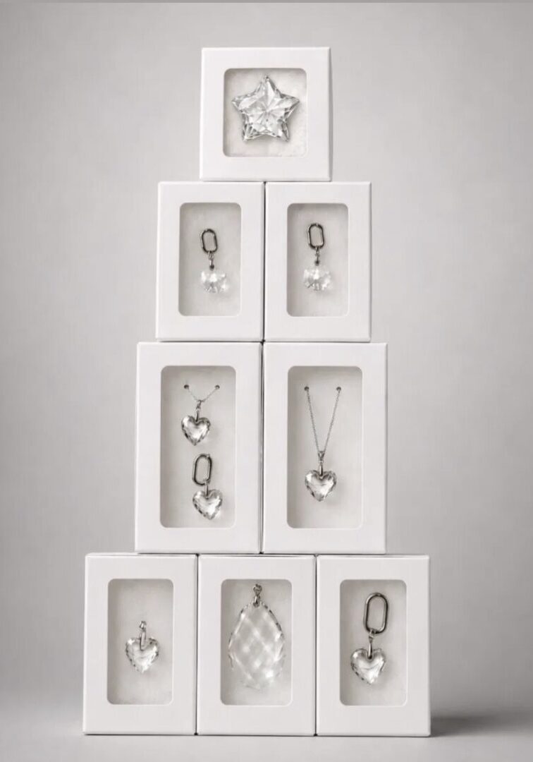 Stacked white boxes with crystal pendants